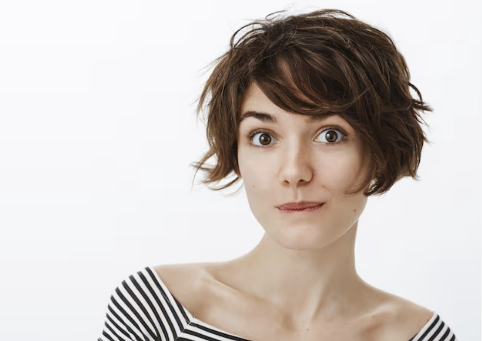 Woman with a soft textured short brunette haircut